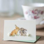 Mini Rabbits kissing